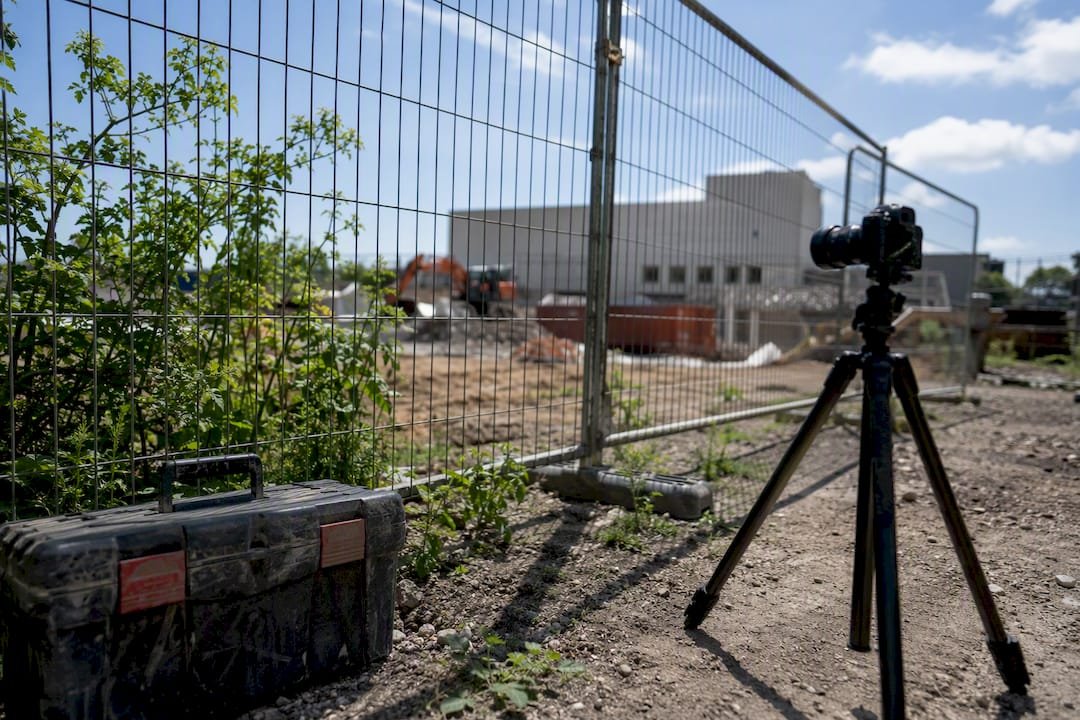 Demolition site fencing with inspection camera setup