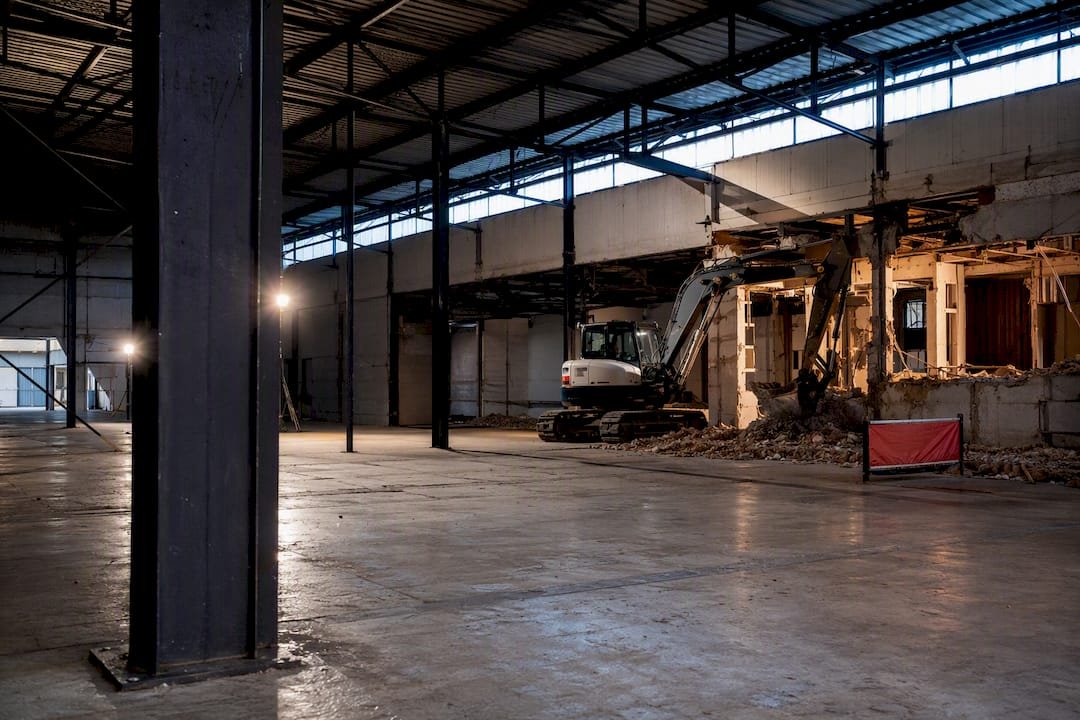 Planned demolition inside an industrial warehouse