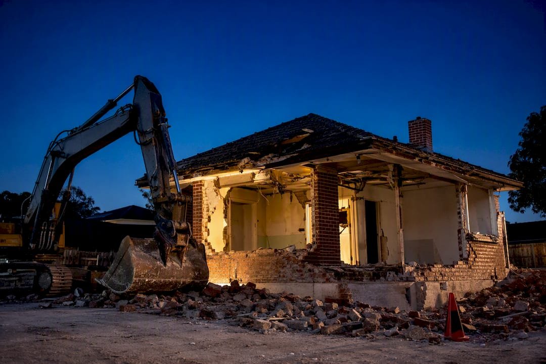 Partially demolished Australian home on cleared site